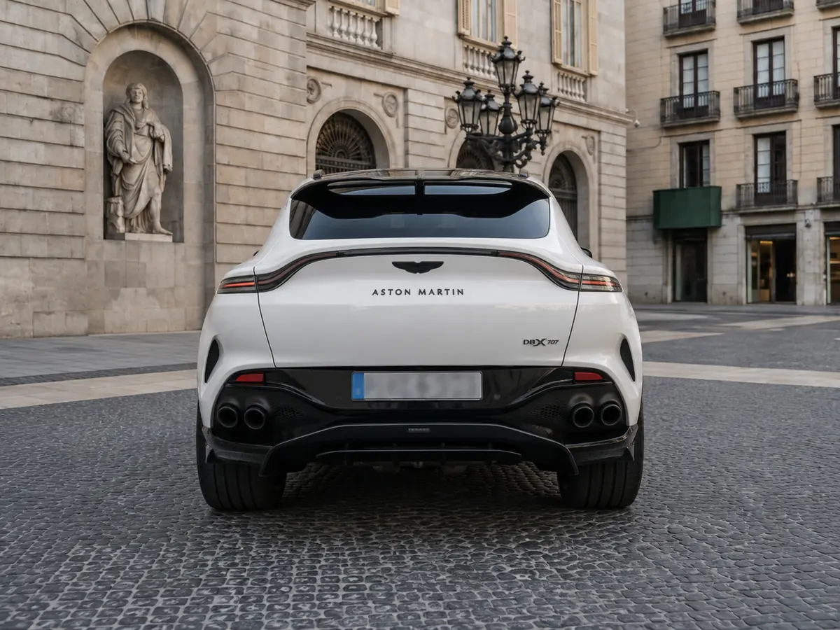 Aston Martin DBX 707 2026, rear view — Lisbon Luxury Car Rental, Lisbon. The Aston Martin DBX 707 pairs a 707 hp powertrain with a five-seat cabin, giving it a…
