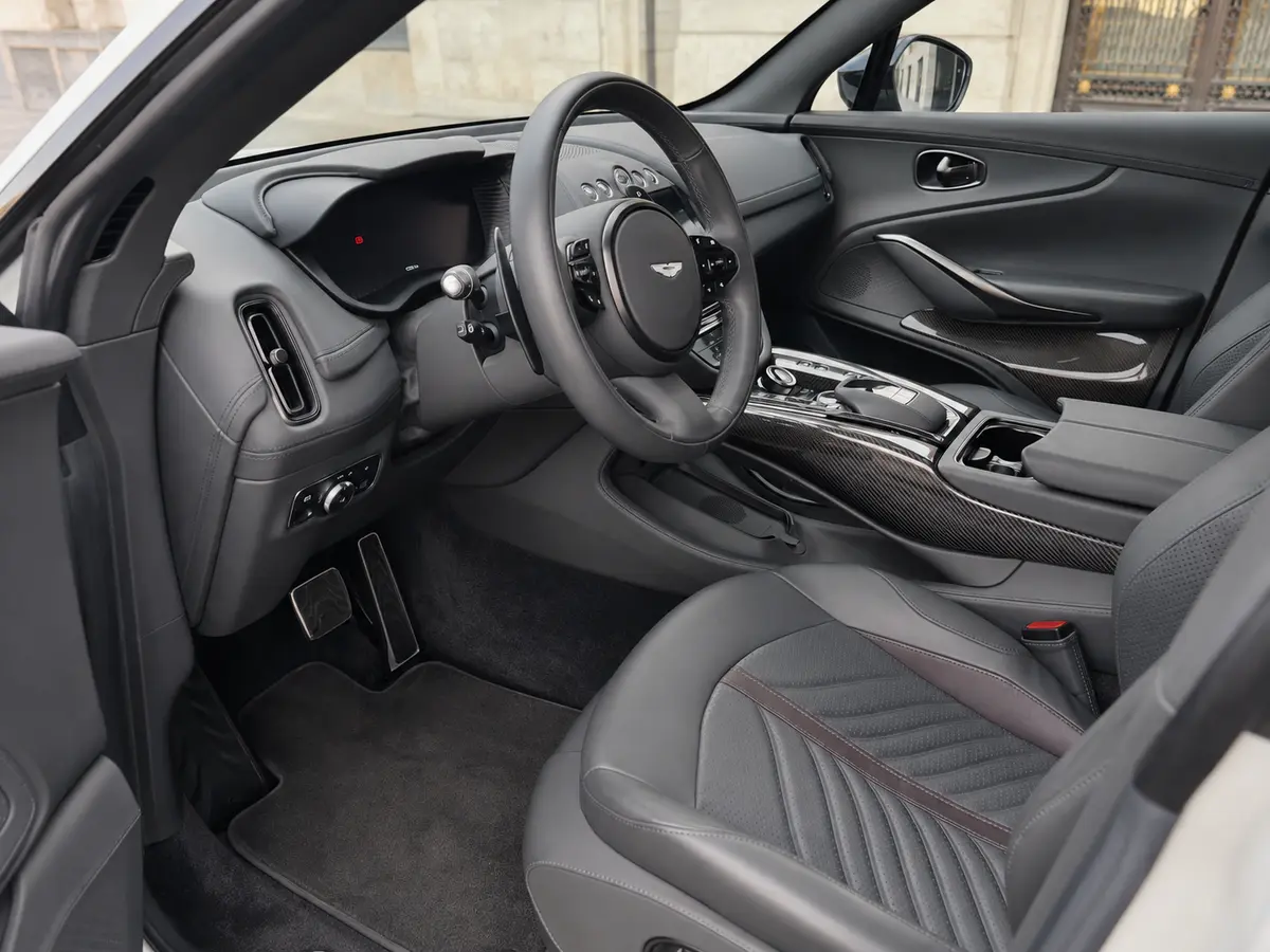 Aston Martin DBX 707 2026, interior — Lisbon Luxury Car Rental, Lisbon. The Aston Martin DBX 707 pairs a 707 hp powertrain with a five-seat cabin, giving it a…
