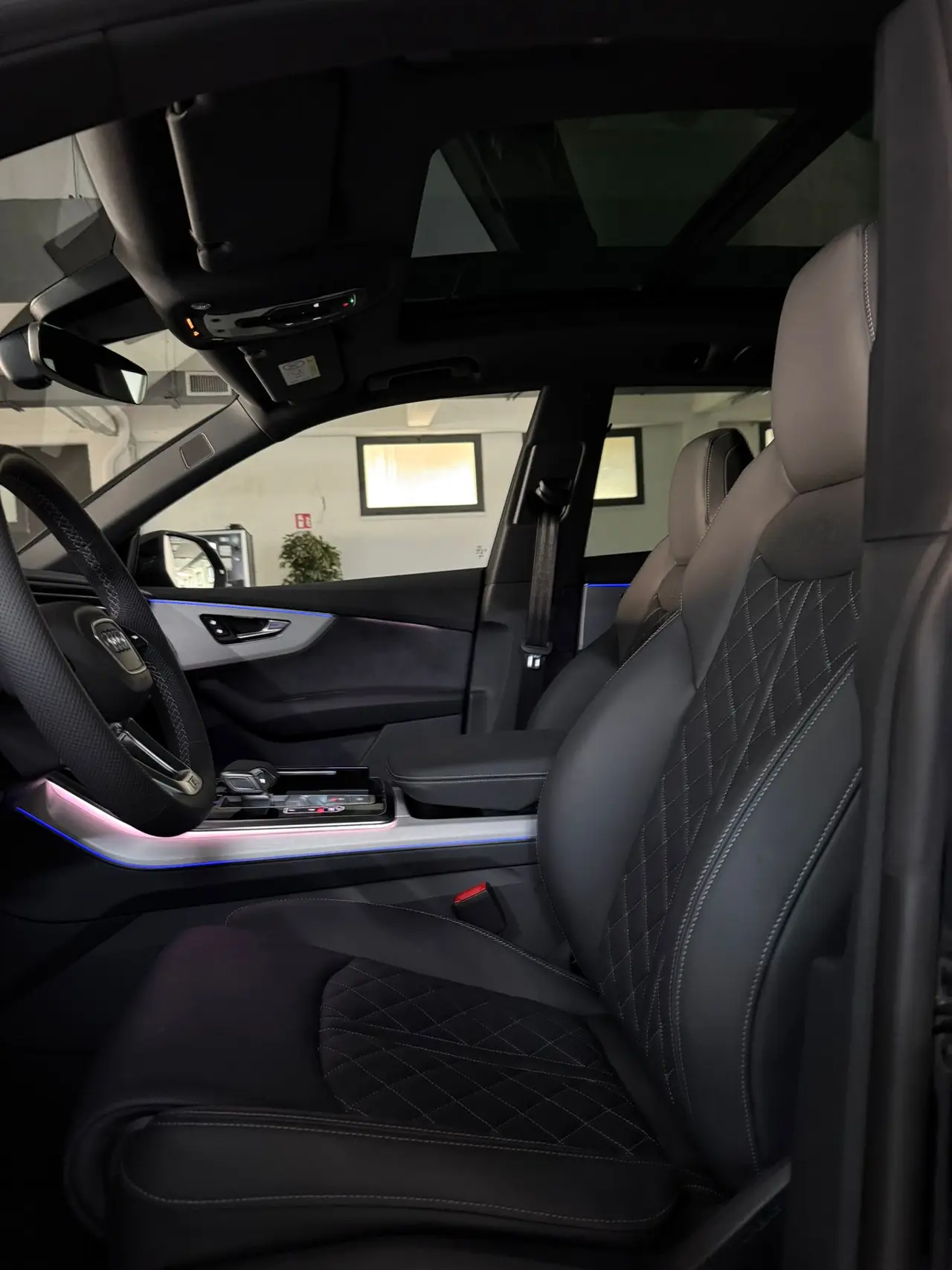 Audi Q8 2025, rear view — Lisbon Luxury Car Rental, Lisbon. The 2025 Audi Q8 carries its 340 hp with the kind of composure that suits a full-size SUV…