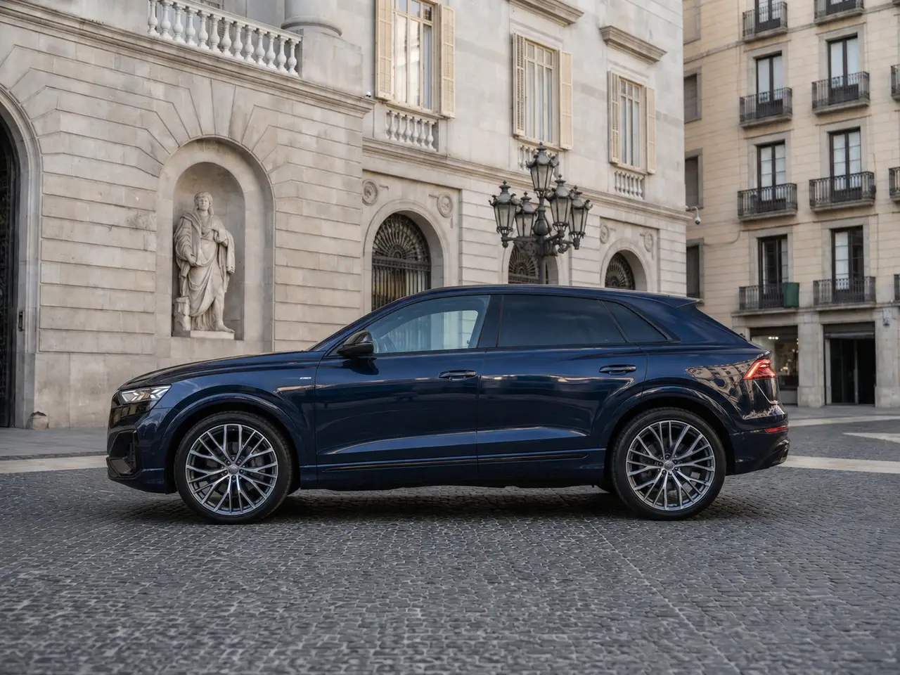 Audi Q8 55 TFSI 2022, exterior — Lisbon Luxury Car Rental, Lisbon. The Audi Q8 55 TFSI brings a composed, substantial character to the road: 340 hp routed…