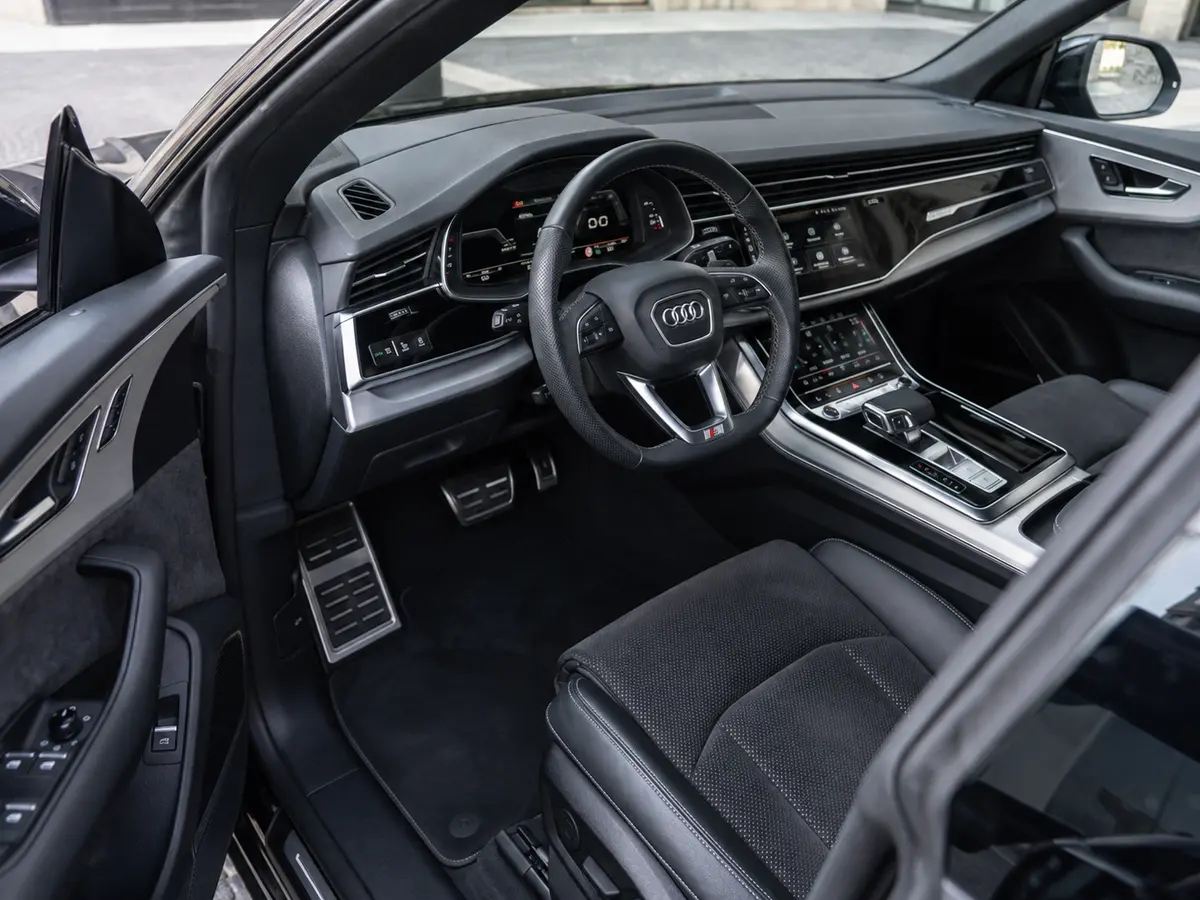 Audi Q8 55 TFSI 2022, interior — Lisbon Luxury Car Rental, Lisbon. The Audi Q8 55 TFSI brings a composed, substantial character to the road: 340 hp routed…