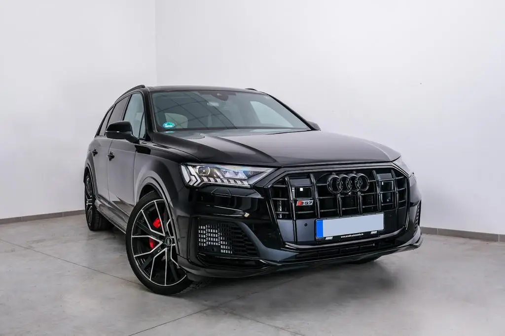 Audi SQ7 2025, rear view — Lisbon Luxury Car Rental, Lisbon. The 2025 Audi SQ7 pairs 507 hp with the composure Audi's larger SUVs are known for: a…