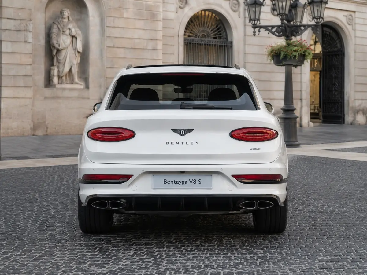 Bentley Bentayga V8-S 2024, rear view — Lisbon Luxury Car Rental, Lisbon. The Bentley Bentayga V8-S carries its 550 hp with the kind of composure that defines…