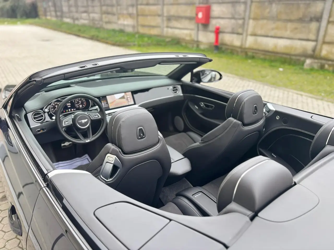 Bentley Continental GTC S V8 2025, side profile — Lisbon Luxury Car Rental, Lisbon. The Bentley Continental GTC S V8 is a grand tourer built for open-air distance rather…