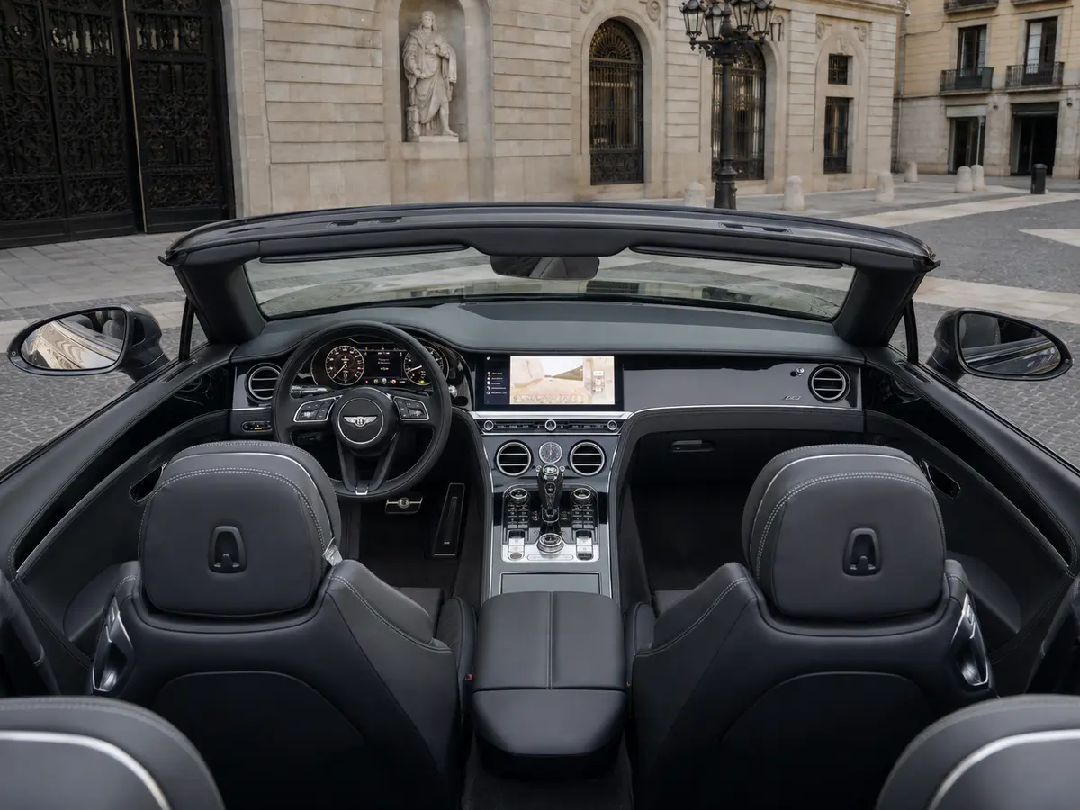 Bentley Continental GTC S V8 2025, interior — Lisbon Luxury Car Rental, Lisbon. The Bentley Continental GTC S V8 is a grand tourer built for open-air distance rather…