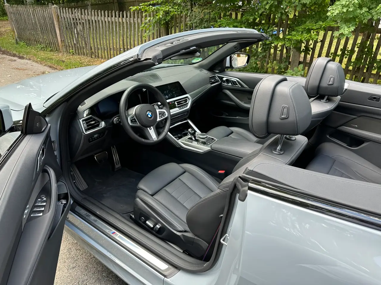 BMW 430i Cabrio 2023, interior — Lisbon Luxury Car Rental, Lisbon. The BMW 430i Cabrio pairs a 245 hp turbocharged engine with a soft-top roof that lowers…
