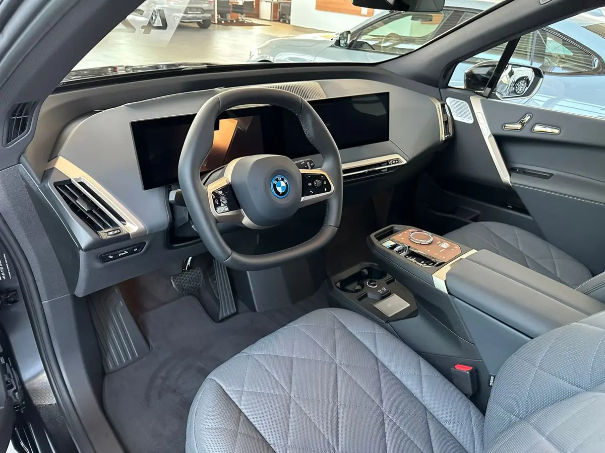 BMW IX M60 2023, exterior — Lisbon Luxury Car Rental, Lisbon. Silent power for early coastal runs to Cascais