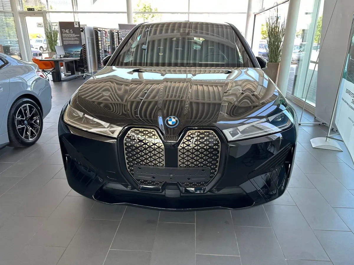 BMW IX M60 2023, front view — Lisbon Luxury Car Rental, Lisbon. Silent power for early coastal runs to Cascais
