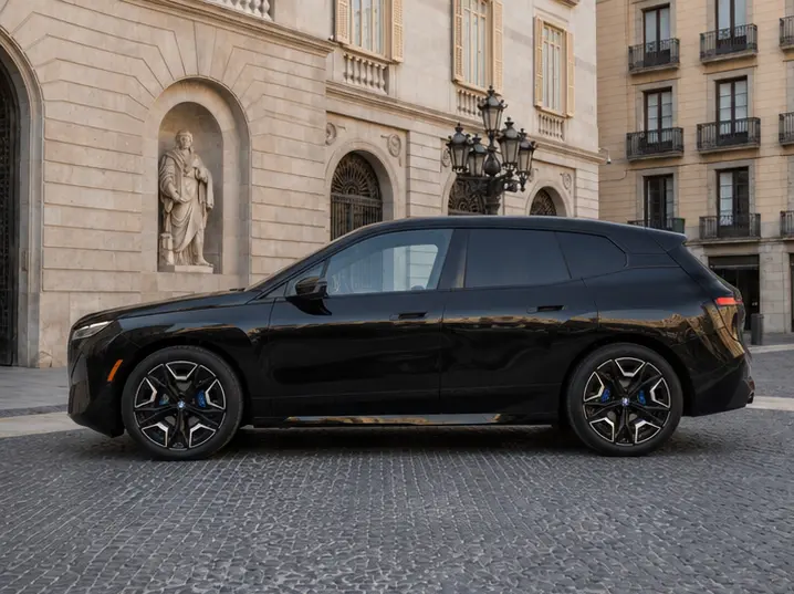 BMW IX M60 2023, interior — Lisbon Luxury Car Rental, Lisbon. The 2023 BMW iX M60 brings a different kind of presence to the fleet: full electric power…