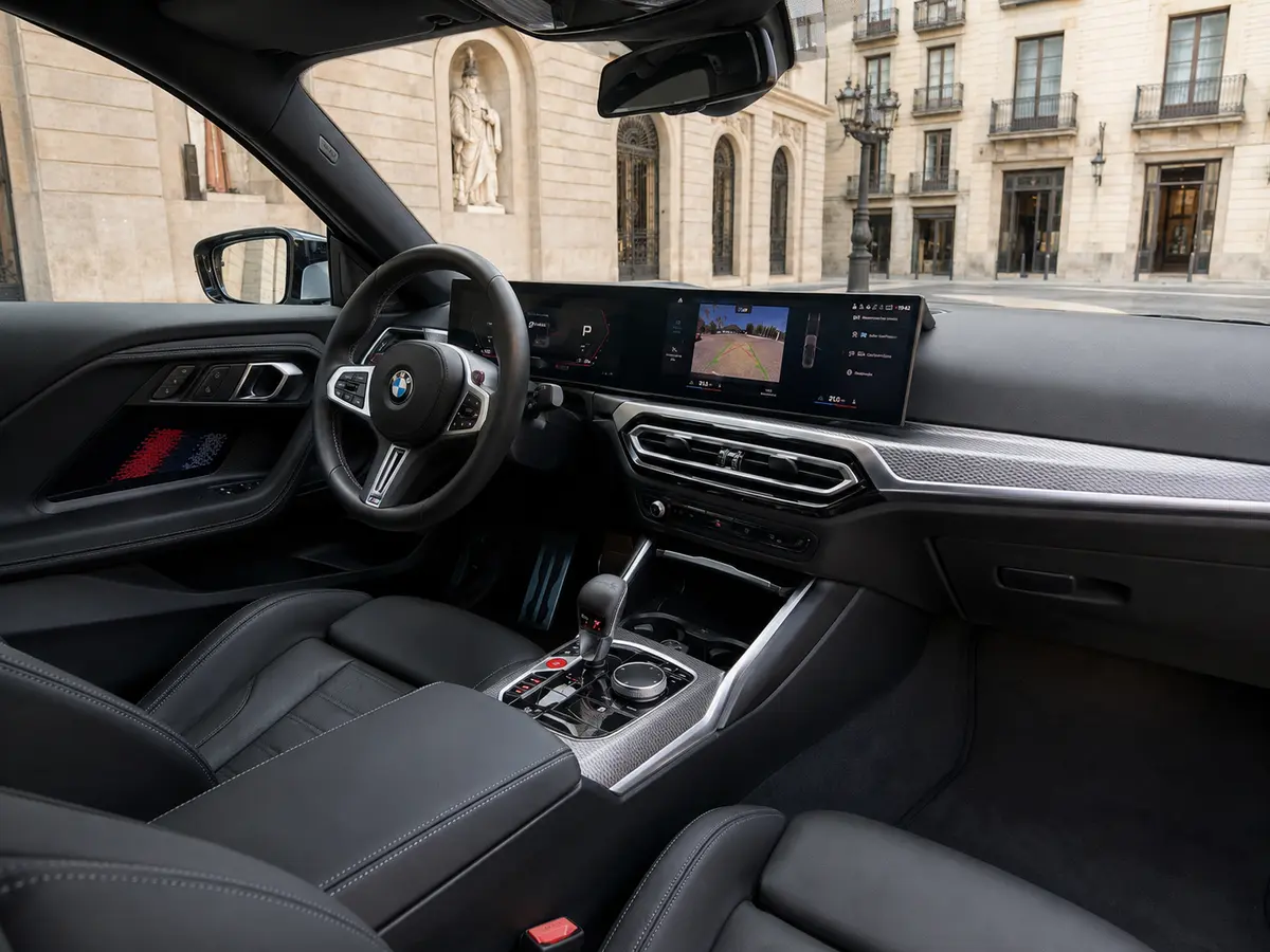 BMW M2 2024, interior — Lisbon Luxury Car Rental, Lisbon. The 2024 BMW M2 is built for drivers who want feedback, not just speed. With 460 hp and a…