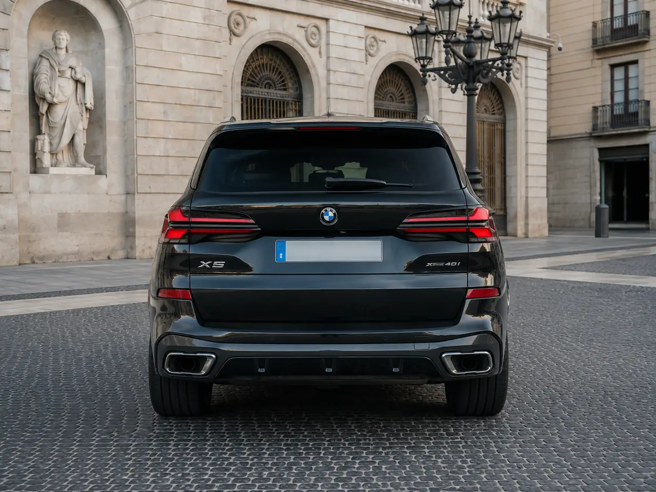 BMW X5 4.0i M 2025, rear view — Lisbon Luxury Car Rental, Lisbon. The BMW X5 4.0i M carries its 381 hp with the kind of composure that defines a modern…