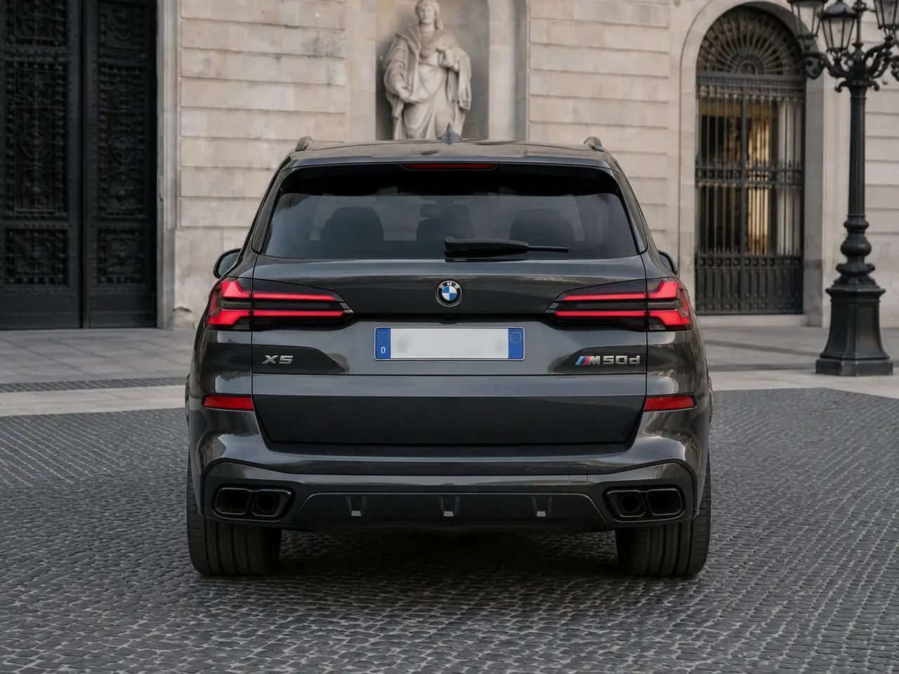 BMW X5 M-pack 30d 2025, rear view — Lisbon Luxury Car Rental, Lisbon. The BMW X5 M-pack 30d pairs diesel torque with the composure BMW's M suspension tuning is…