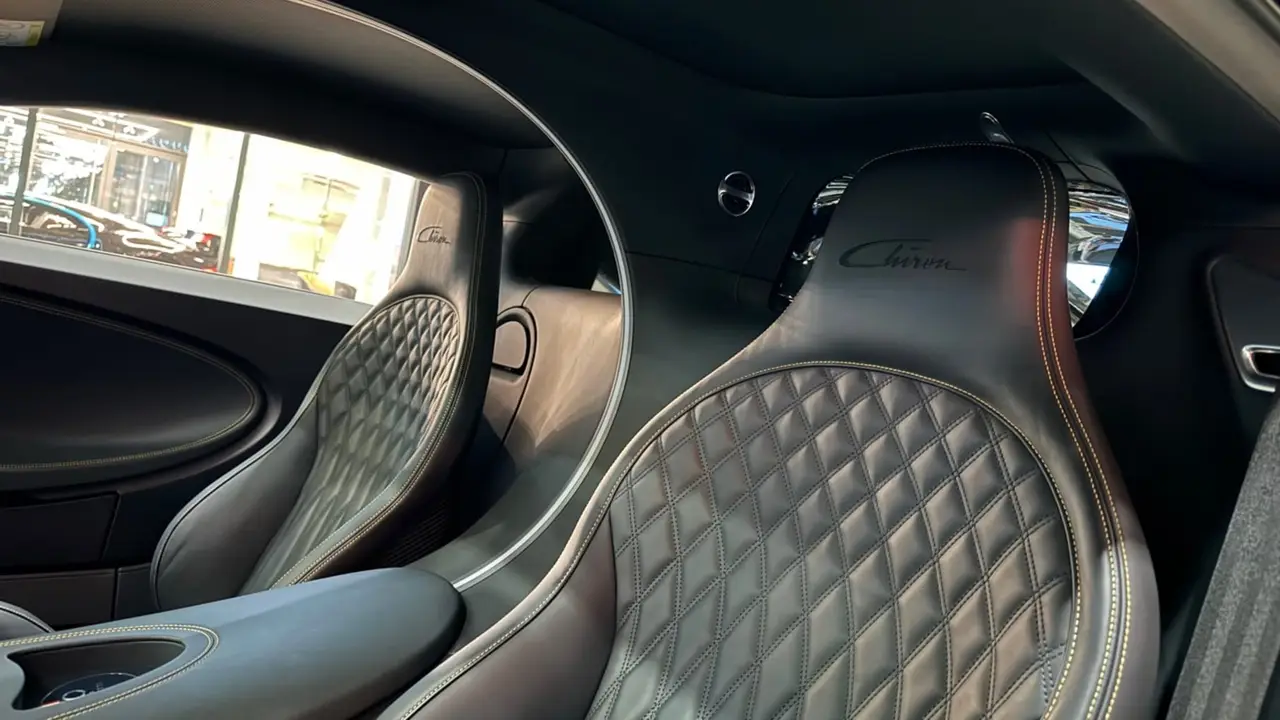 Bugatti Chiron 110 Ani 2019, interior — Lisbon Luxury Car Rental, Lisbon. The Bugatti Chiron 110 Ani is a limited anniversary build marking Bugatti's 110th year,…