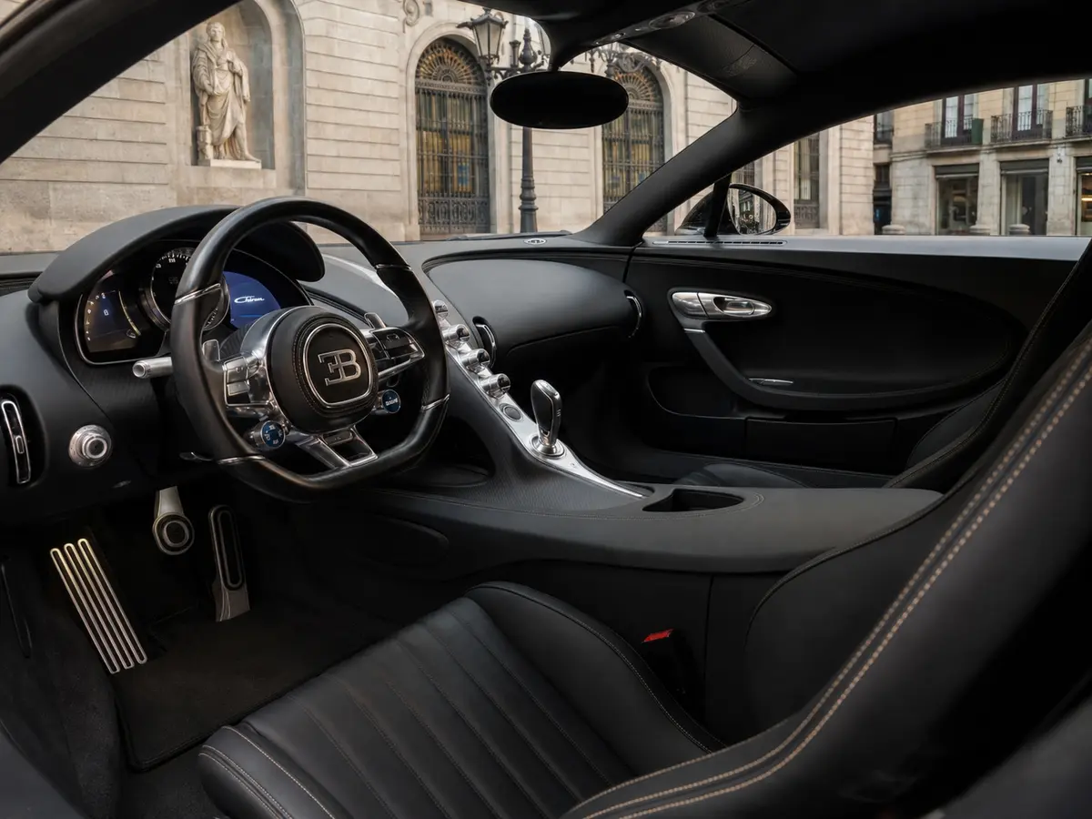 Bugatti Chiron 110 Ani 2019, interior — Lisbon Luxury Car Rental, Lisbon. The Bugatti Chiron 110 Ani is a limited anniversary build marking Bugatti's 110th year,…