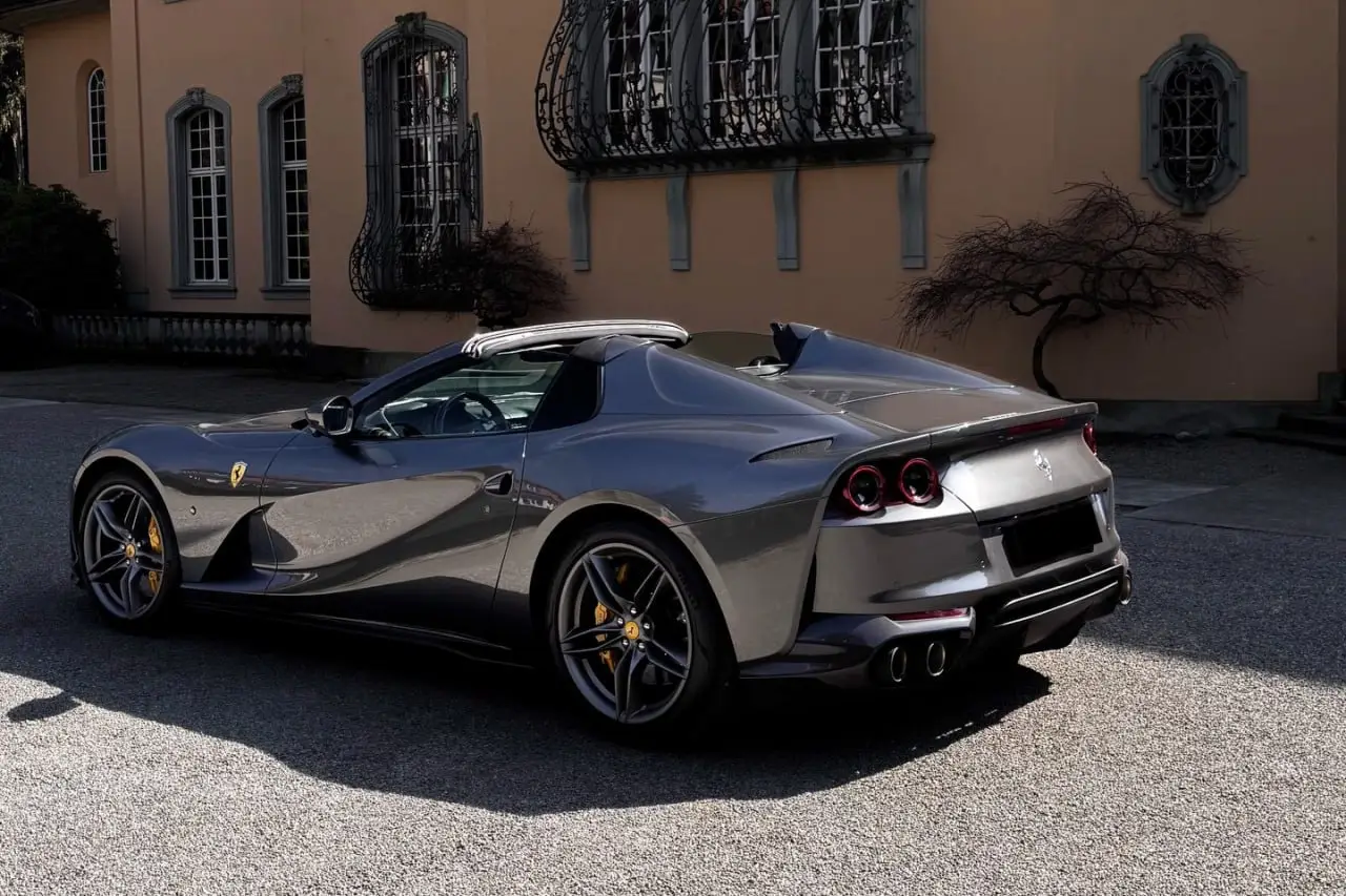 Ferrari 812 GTS 2024, front view — Lisbon Luxury Car Rental, Lisbon. The Ferrari 812 GTS pairs a naturally aspirated V12 producing 800 hp with a folding hard…
