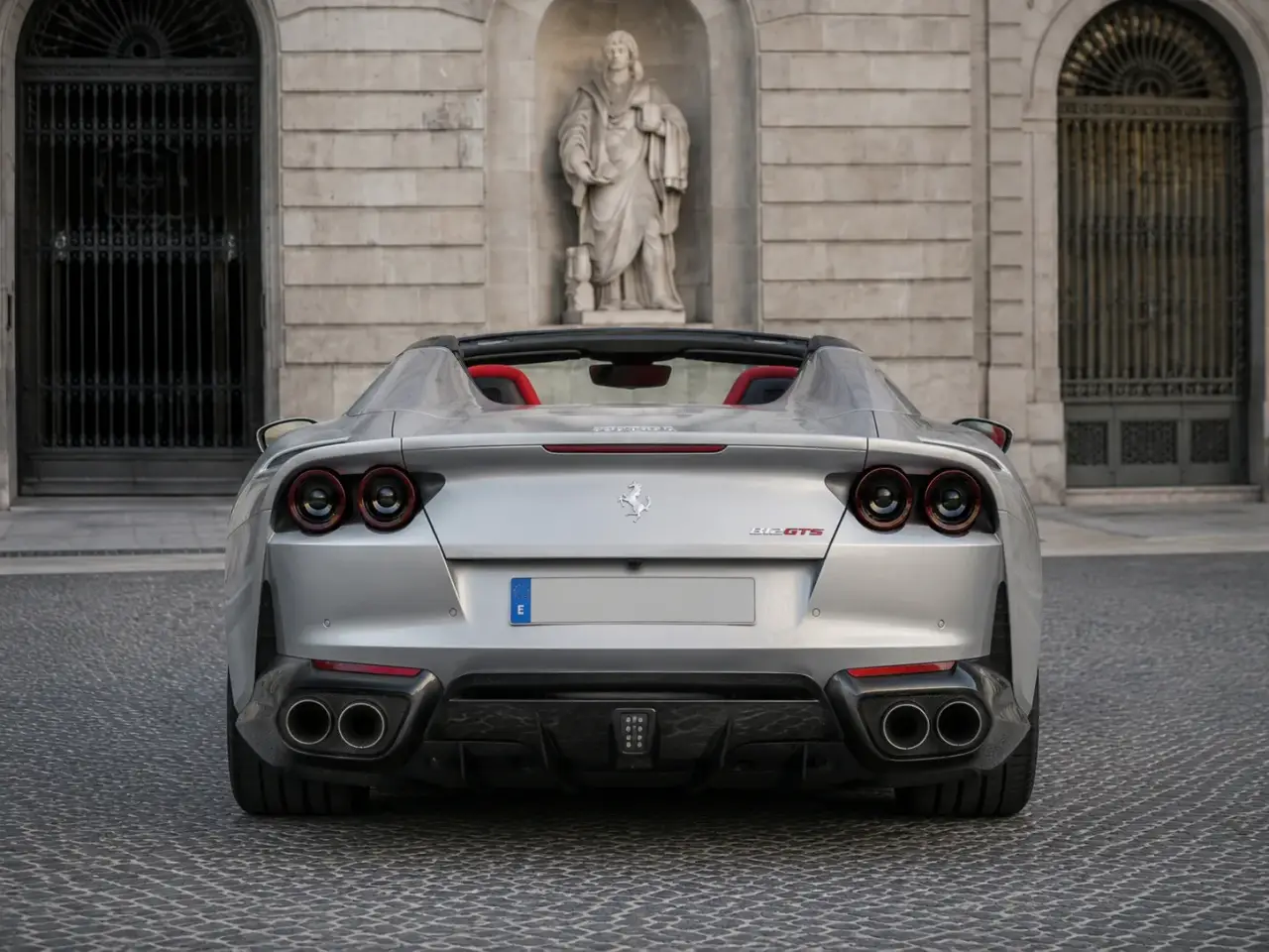 Ferrari 812 GTS 2024, rear view — Lisbon Luxury Car Rental, Lisbon. The Ferrari 812 GTS pairs a naturally aspirated V12 producing 800 hp with a folding hard…