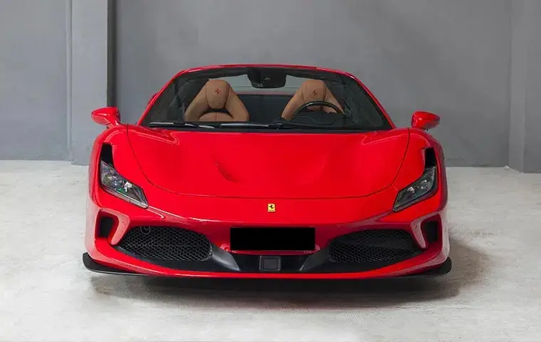 Ferrari F8 Tributo Spider Red 2023, exterior — Lisbon Luxury Car Rental, Lisbon. The Ferrari F8 Tributo Spider pairs a 720 hp twin-turbo V8 with a retractable hard top,…
