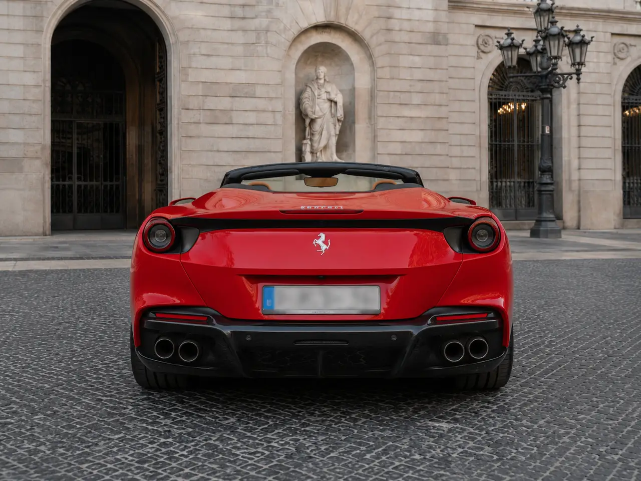 Ferrari Portofino M 2023, rear view — Lisbon Luxury Car Rental, Lisbon. The Portofino M carries 620 hp and four seats under a folding hard top, which sets it…