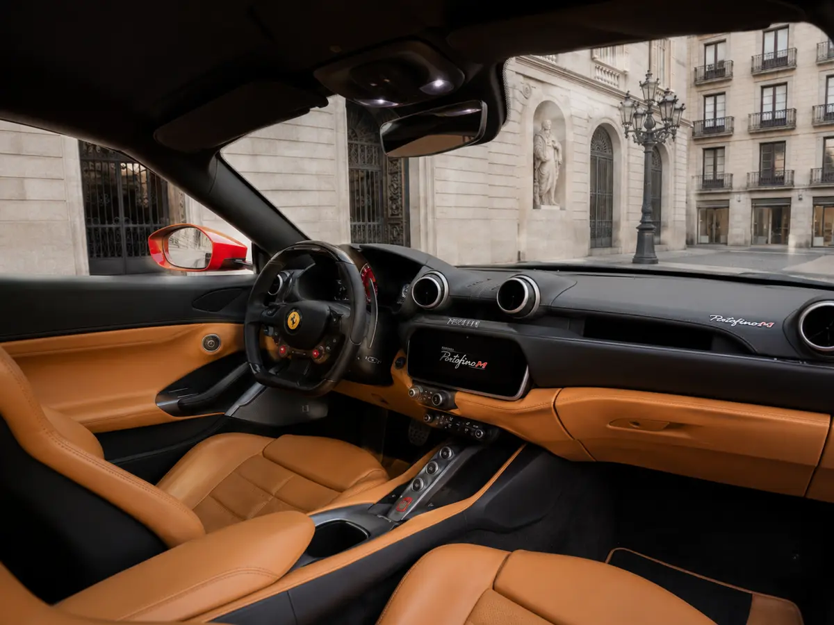 Ferrari Portofino M 2023, interior — Lisbon Luxury Car Rental, Lisbon. The Portofino M carries 620 hp and four seats under a folding hard top, which sets it…