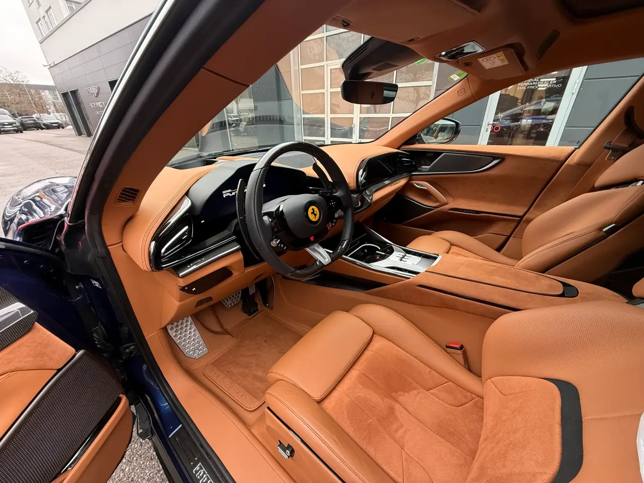 Ferrari Purosangue 2024, rear view — Lisbon Luxury Car Rental, Lisbon. The 2024 Ferrari Purosangue brings something rare to the marque's line-up: five real…