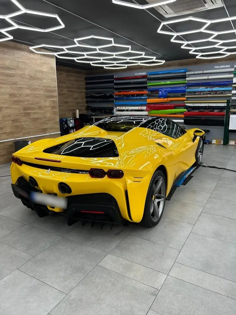 Ferrari SF90 Spider 2024, rear view — Lisbon Luxury Car Rental, Lisbon. The Ferrari SF90 Spider sits at the top of the marque's current range, and it feels that…