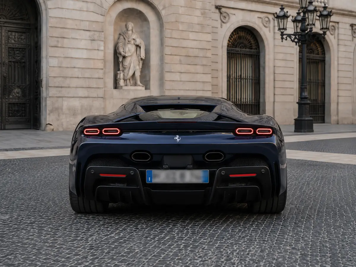 Ferrari SF90 Stradale 2025, rear view — Lisbon Luxury Car Rental, Lisbon. The Ferrari SF90 Stradale is Maranello's most powerful road car to date, a plug-in hybrid…
