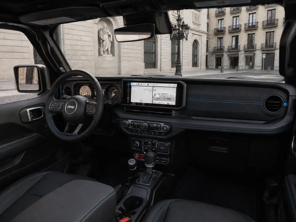 Jeep Wrangler 2025, interior — Lisbon Luxury Car Rental, Lisbon. The 2025 Jeep Wrangler brings a different kind of presence to the fleet: upright, boxy,…