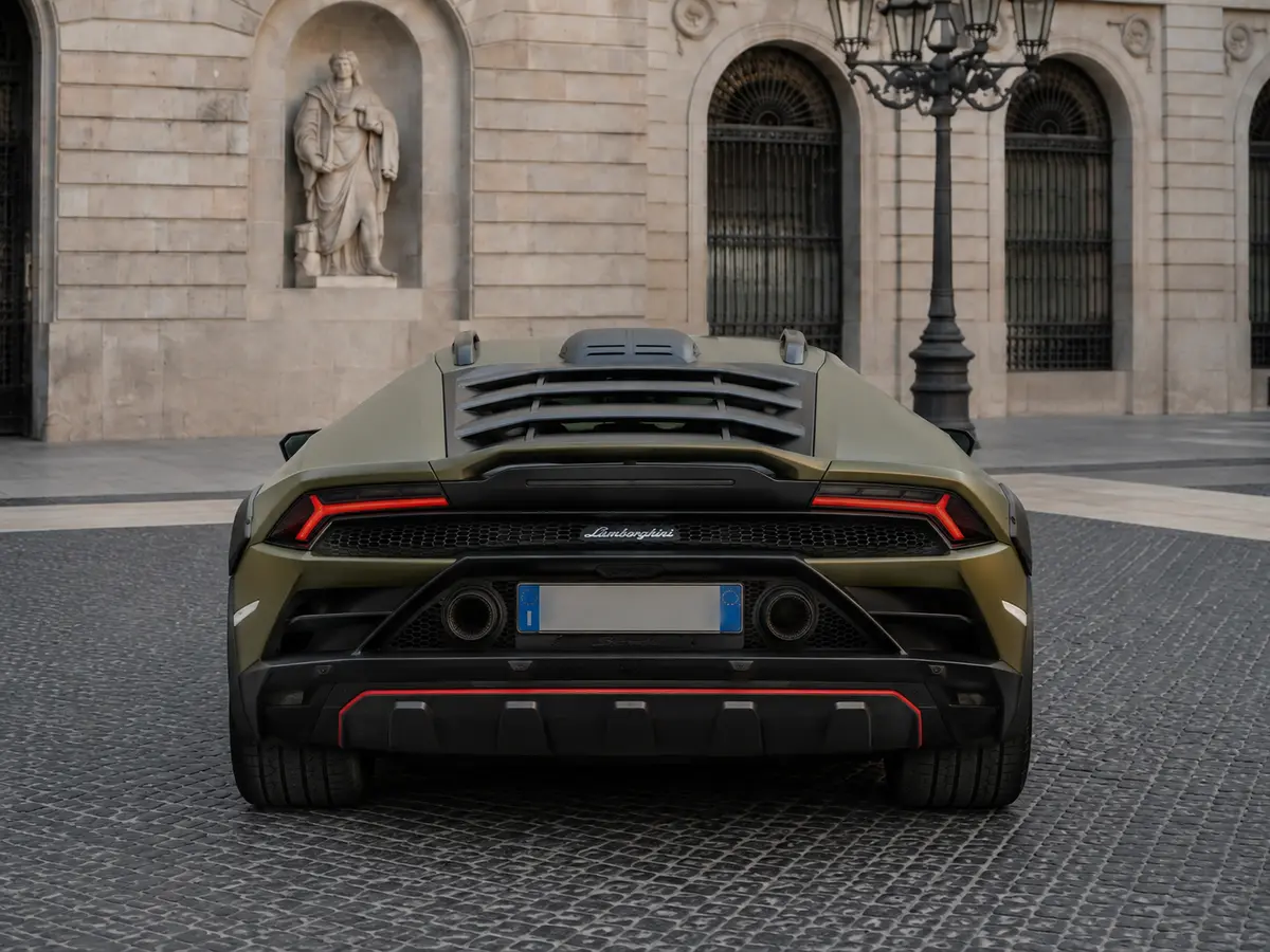 Lamborghini Huracan Sterrato 2024, rear view — Lisbon Luxury Car Rental, Lisbon. The Lamborghini Huracan Sterrato is the version of the Huracan built for surfaces the…