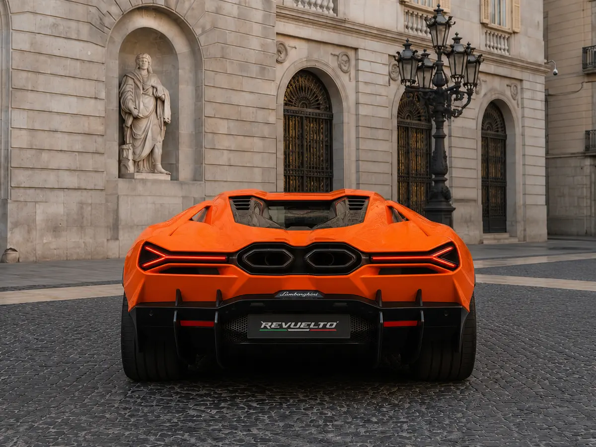 Lamborghini Revuelto 2026, rear view — Lisbon Luxury Car Rental, Lisbon. The Revuelto is Lamborghini's first series-production V12 hybrid, and it drives like an…