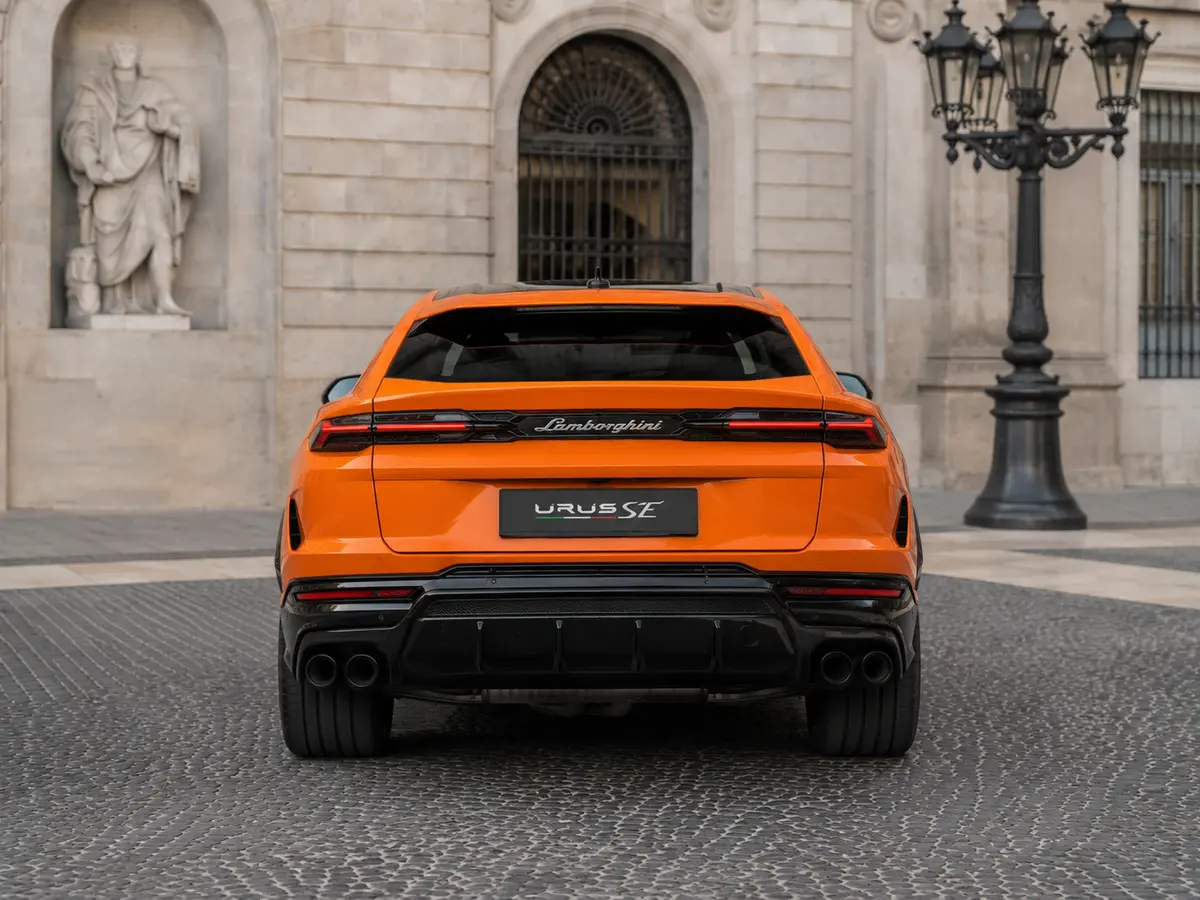Lamborghini URUS SE 2025, rear view — Lisbon Luxury Car Rental, Lisbon. The Lamborghini URUS SE occupies a category of its own: a five-seat SUV built by a marque…