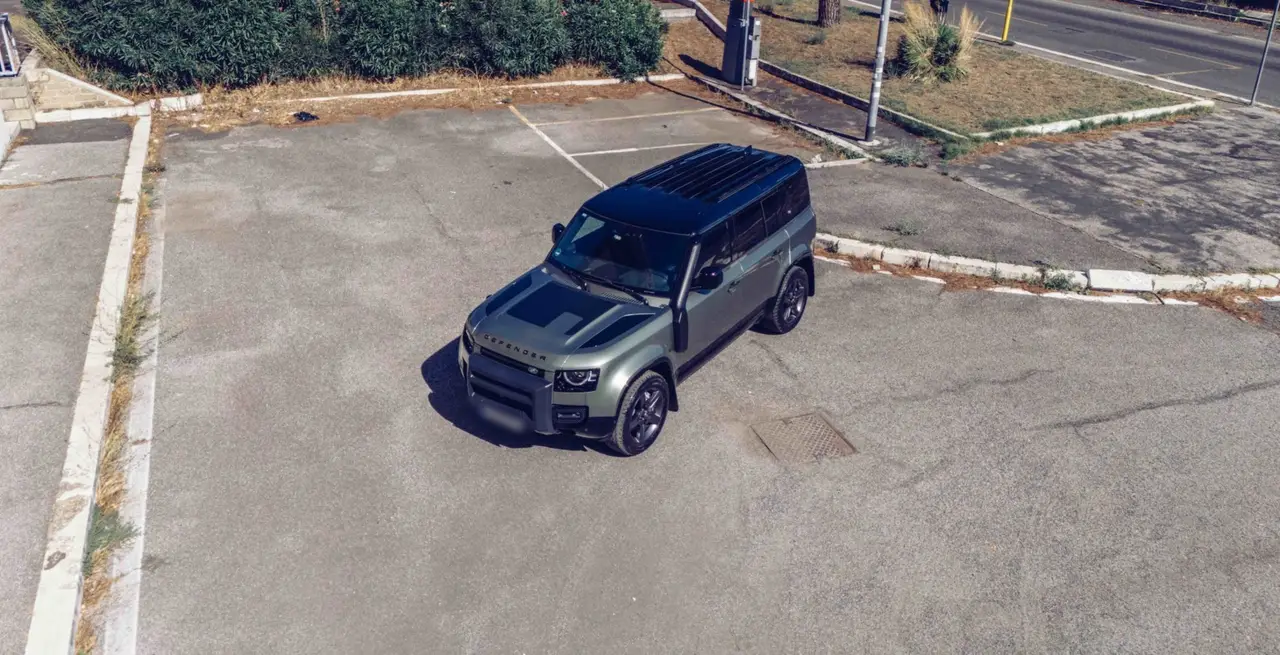 Land Rover Defender X-Dynamic 7 seater 2024, rear view — Lisbon Luxury Car Rental, Lisbon. The 2024 Land Rover Defender X-Dynamic brings a different kind of presence to the fleet:…