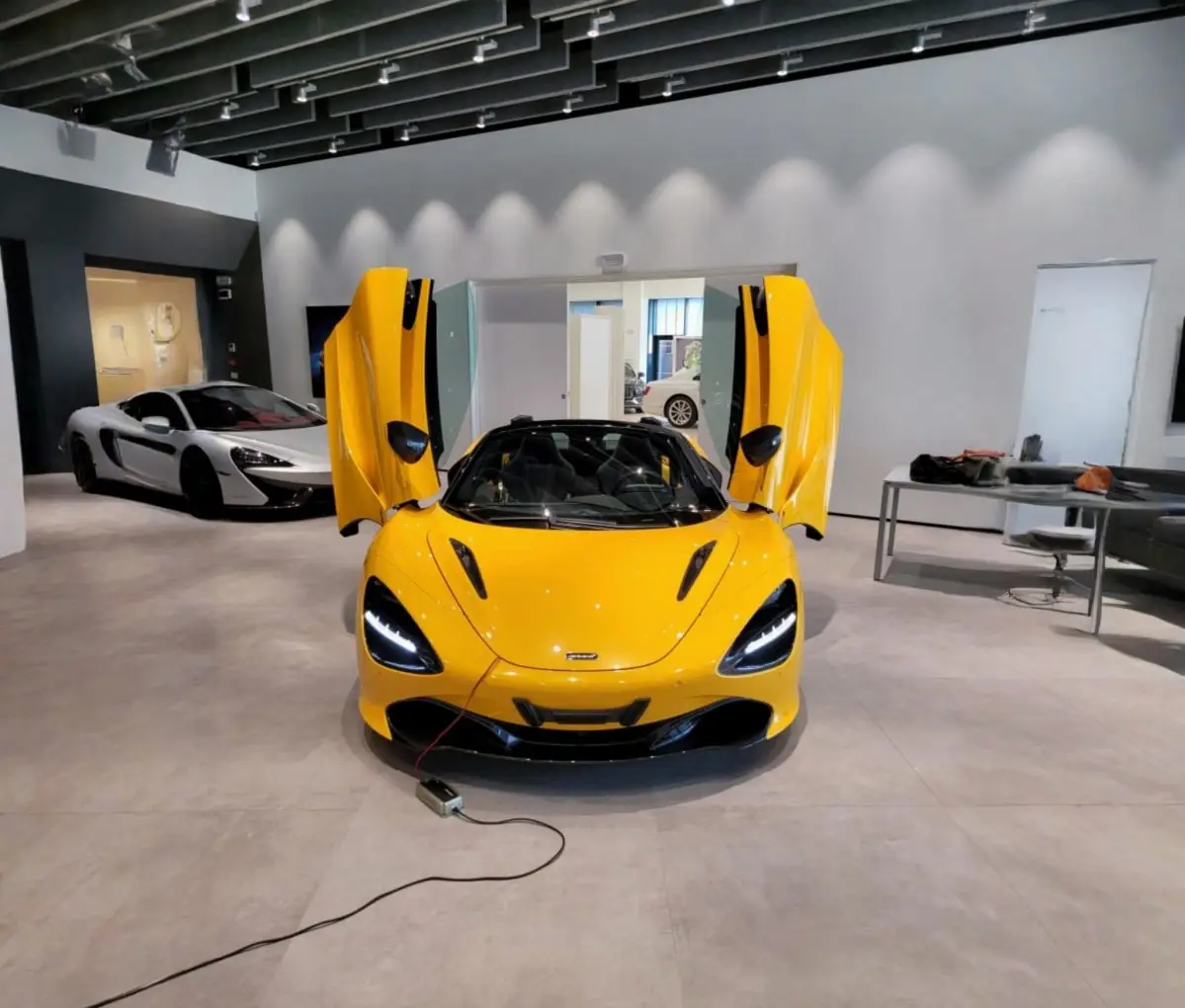 McLaren 720S Spider 2022, exterior — Lisbon Luxury Car Rental, Lisbon. The 2022 McLaren 720S Spider carries 720 hp through a mid-engine layout built for…