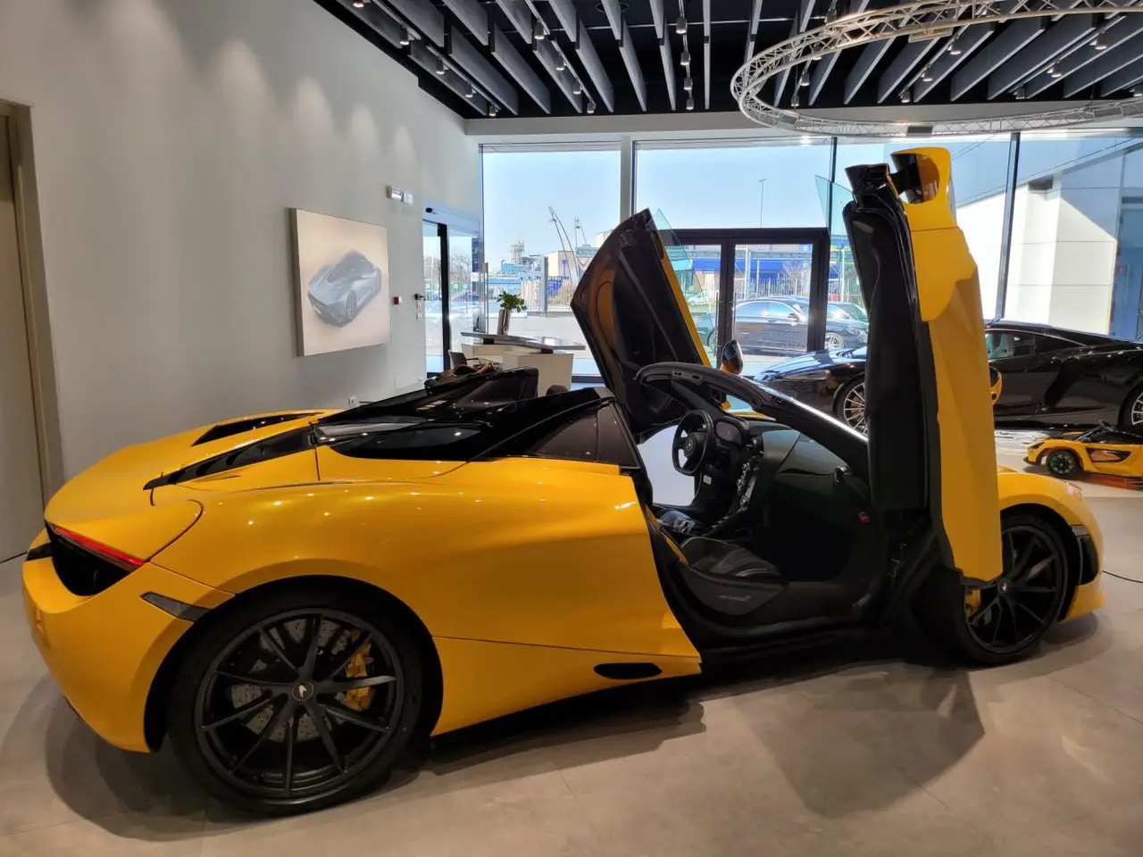 McLaren 720S Spider 2022, front view — Lisbon Luxury Car Rental, Lisbon. The 2022 McLaren 720S Spider carries 720 hp through a mid-engine layout built for…