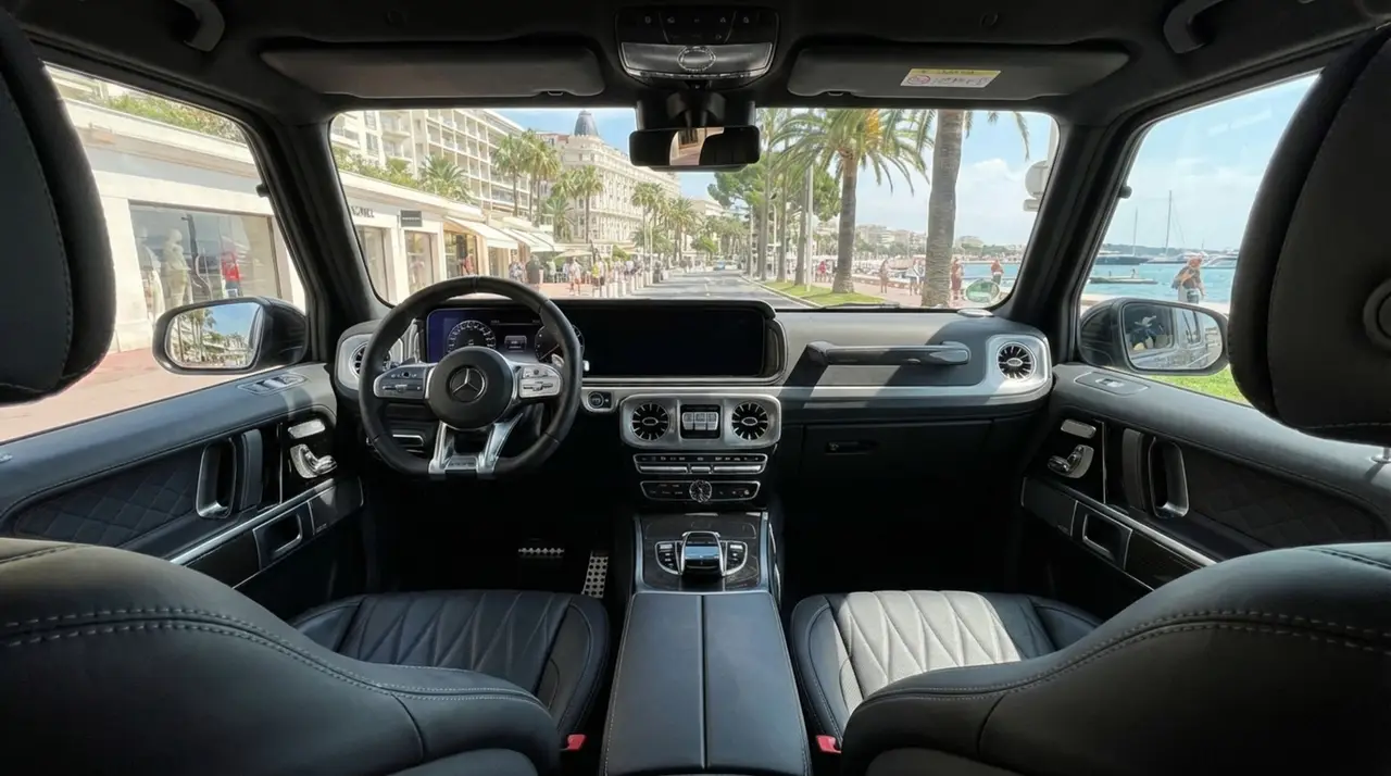 Mercedes Benz G63 2023, interior — Lisbon Luxury Car Rental, Lisbon. The Mercedes-Benz G63 does not try to disguise its size or its intent. At 585 hp, the…