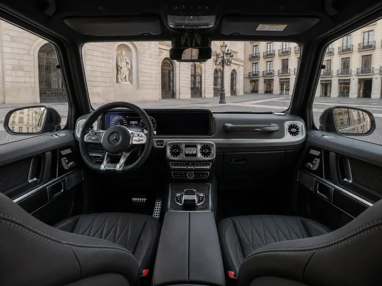 Mercedes Benz G63 2023, rear view — Lisbon Luxury Car Rental, Lisbon. The Mercedes-Benz G63 does not try to disguise its size or its intent. At 585 hp, the…