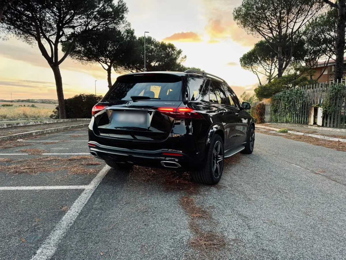 Mercedes Benz GLE 450 AMG 2024, rear view — Lisbon Luxury Car Rental, Lisbon. Family comfort for the Arrábida cliffs and beaches