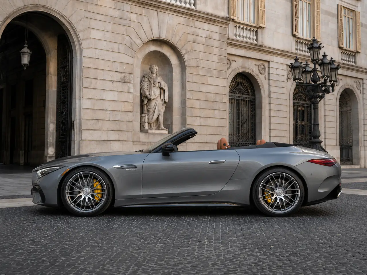 Mercedes Benz SL63 Cabrio 2023, exterior — Lisbon Luxury Car Rental, Lisbon. The Mercedes Benz SL63 Cabrio pairs a 585 hp V8 with the folding roof and four-seat cabin…