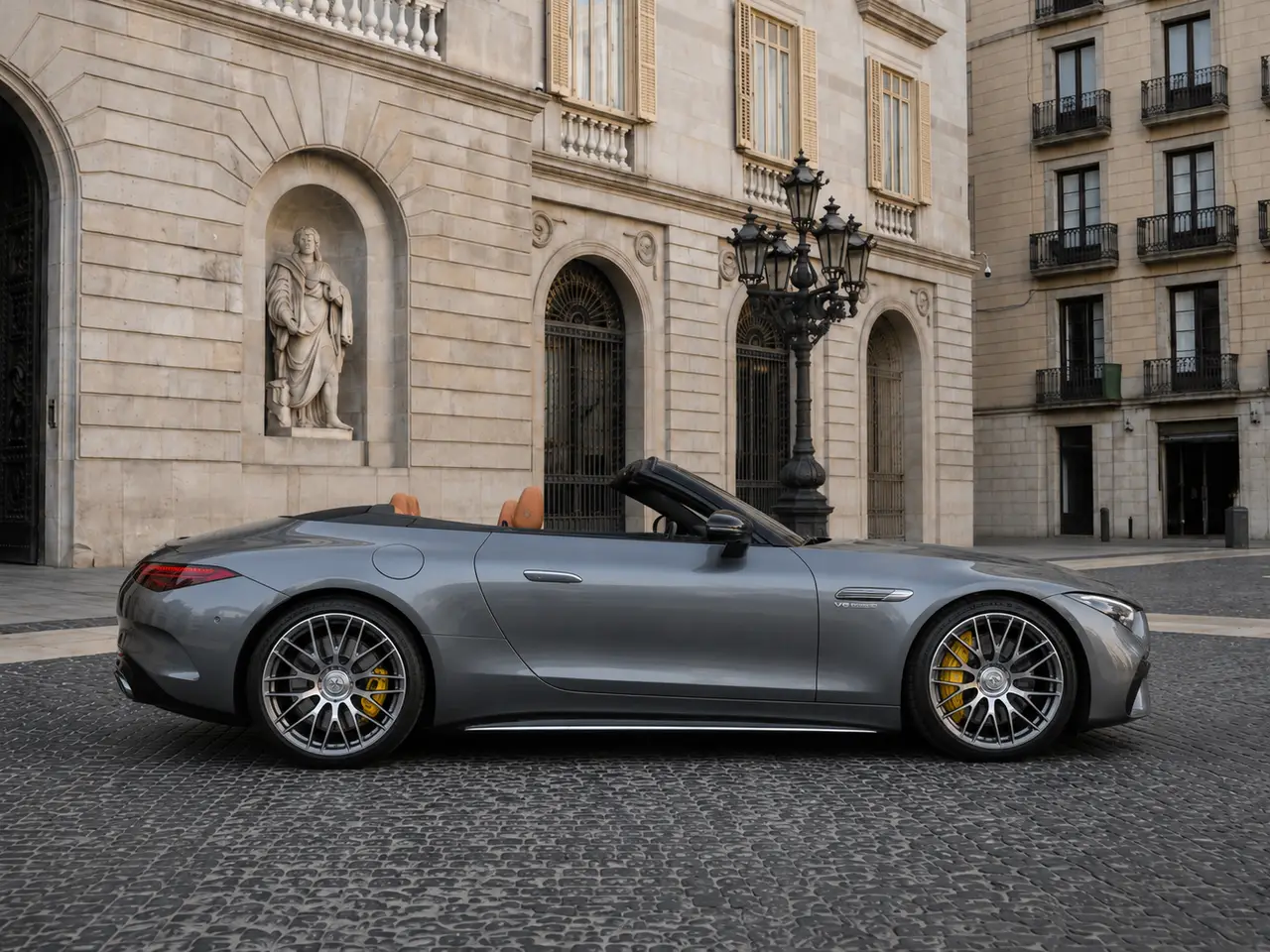 Mercedes Benz SL63 Cabrio 2023, front view — Lisbon Luxury Car Rental, Lisbon. The Mercedes Benz SL63 Cabrio pairs a 585 hp V8 with the folding roof and four-seat cabin…