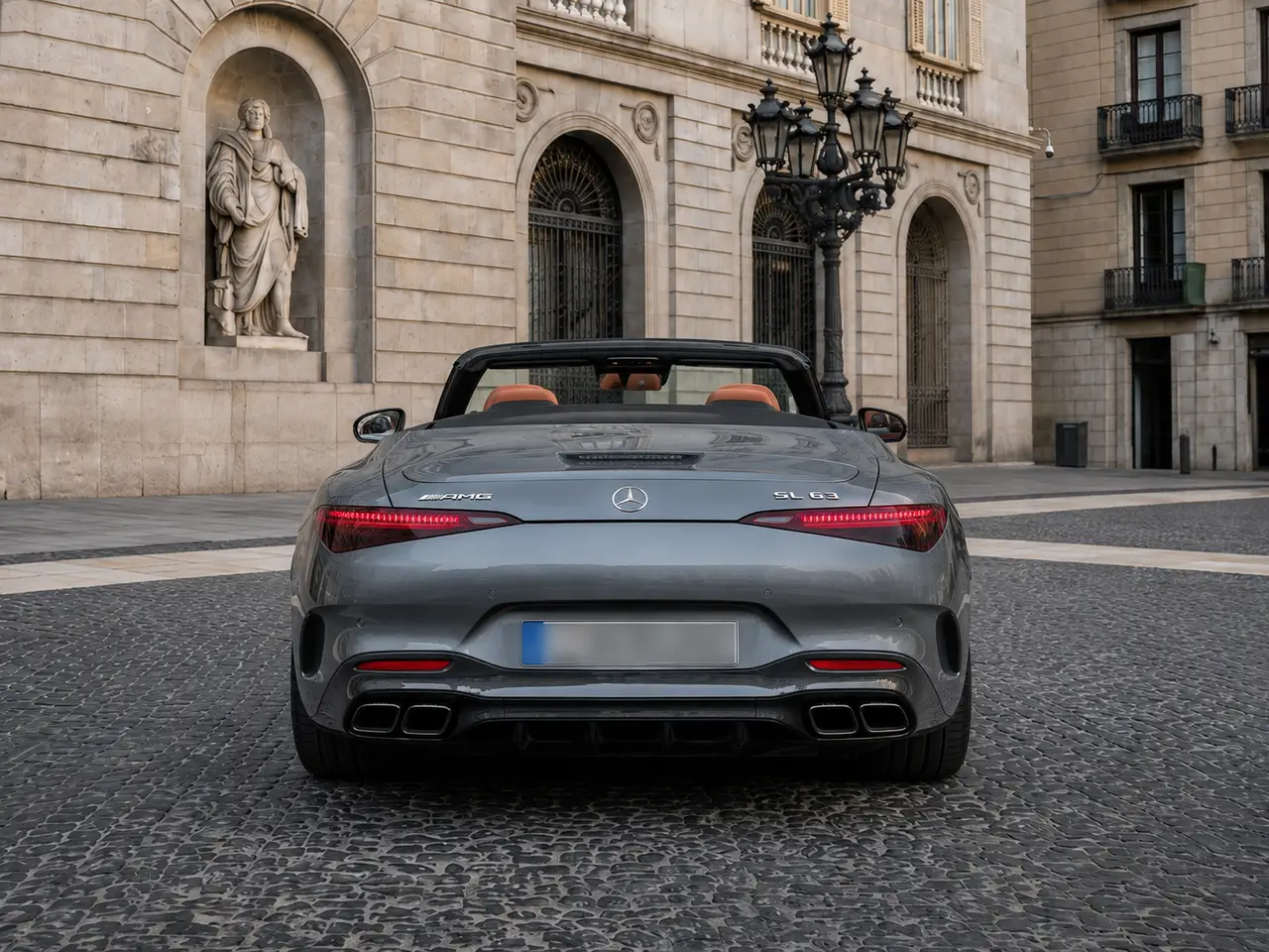 Mercedes Benz SL63 Cabrio 2023, rear view — Lisbon Luxury Car Rental, Lisbon. The Mercedes Benz SL63 Cabrio pairs a 585 hp V8 with the folding roof and four-seat cabin…