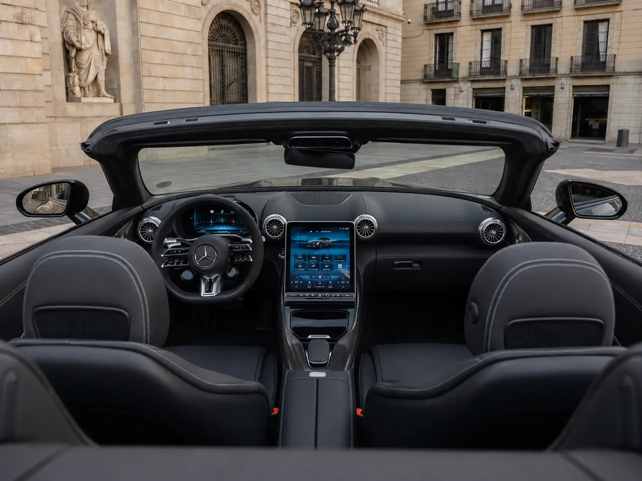 Mercedes Benz SL63 Cabrio 2023, interior — Lisbon Luxury Car Rental, Lisbon. The Mercedes Benz SL63 Cabrio pairs a 585 hp V8 with the folding roof and four-seat cabin…