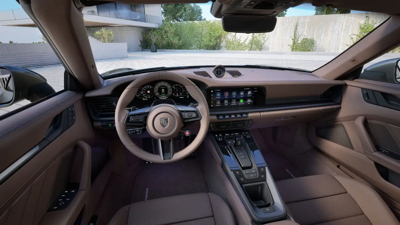 Porsche 911 992 Carrera Turbo S Cabrio 2026, rear view — Lisbon Luxury Car Rental, Lisbon. The 2026 Porsche 911 992 Carrera Turbo S Cabrio pairs 650 hp with the kind of chassis…