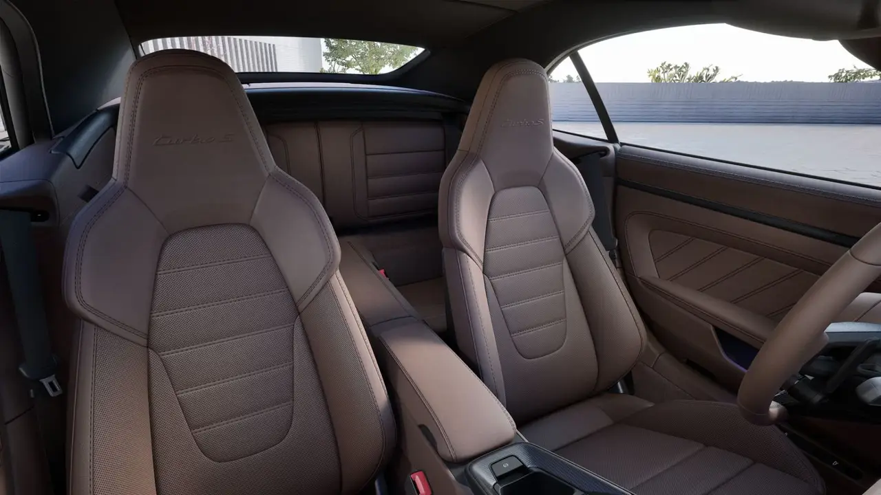 Porsche 911 992 Carrera Turbo S Cabrio 2026, interior — Lisbon Luxury Car Rental, Lisbon. The 2026 Porsche 911 992 Carrera Turbo S Cabrio pairs 650 hp with the kind of chassis…