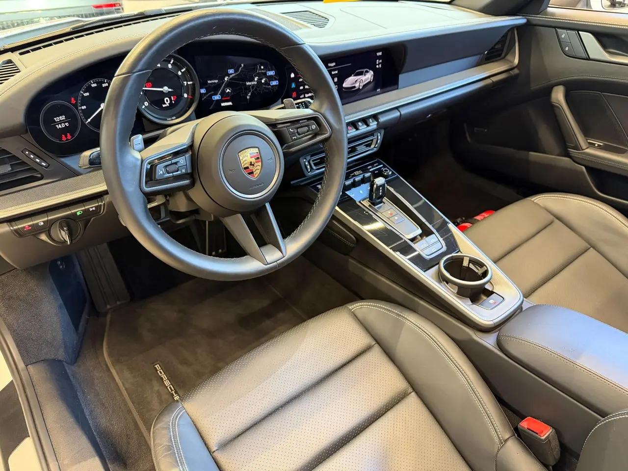 Porsche 911 Carrera S Cabrio (992) 2025, exterior — Lisbon Luxury Car Rental, Lisbon. The 2025 Porsche 911 Carrera S Cabrio (992) carries 480 hp with the composure Porsche's…