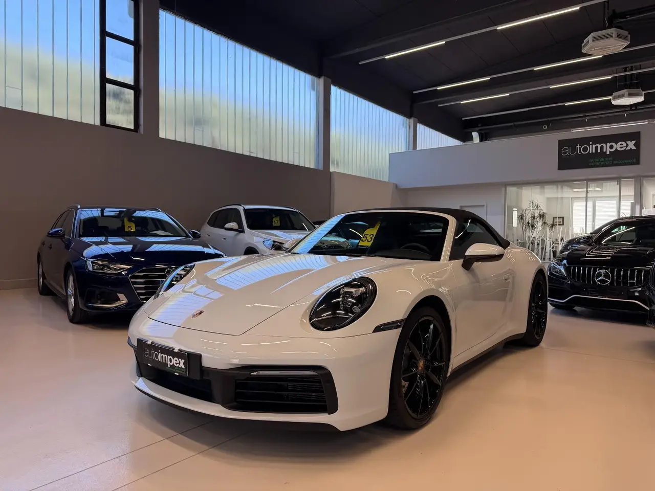 Porsche 911 Carrera S Cabrio (992) 2025, dashboard — Lisbon Luxury Car Rental, Lisbon. The 2025 Porsche 911 Carrera S Cabrio (992) carries 480 hp with the composure Porsche's…