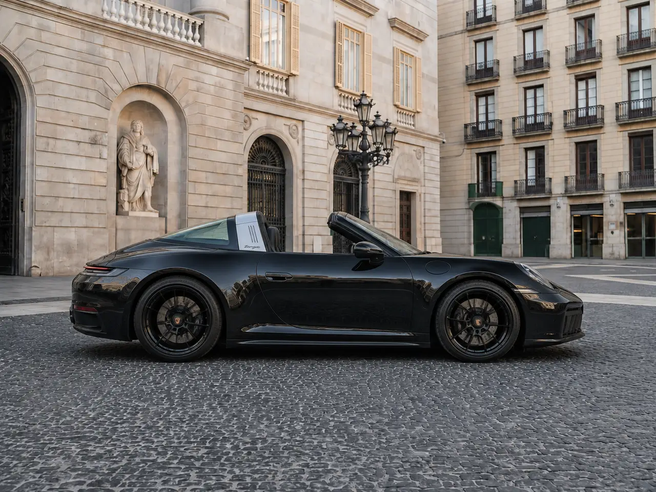 Porsche 911 Targa 2025, front view — Lisbon Luxury Car Rental, Lisbon. The 2025 Porsche 911 Targa pairs the 911's low, deliberate stance with a retractable roof…