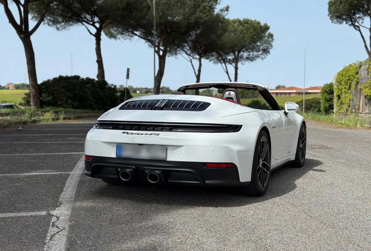 Porsche 992.2 Carrera 4 GTS Cabrio 2025, rear view — Lisbon Luxury Car Rental, Lisbon. The 2025 Porsche 992.2 Carrera 4 GTS Cabrio carries 540 hp through all four wheels, and…