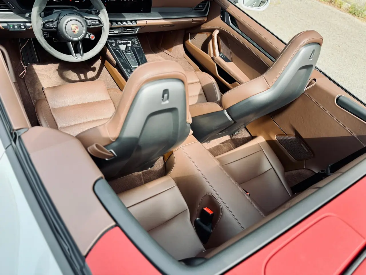 Porsche 992.2 Carrera 4 GTS Cabrio 2025, side profile — Lisbon Luxury Car Rental, Lisbon. The 2025 Porsche 992.2 Carrera 4 GTS Cabrio carries 540 hp through all four wheels, and…