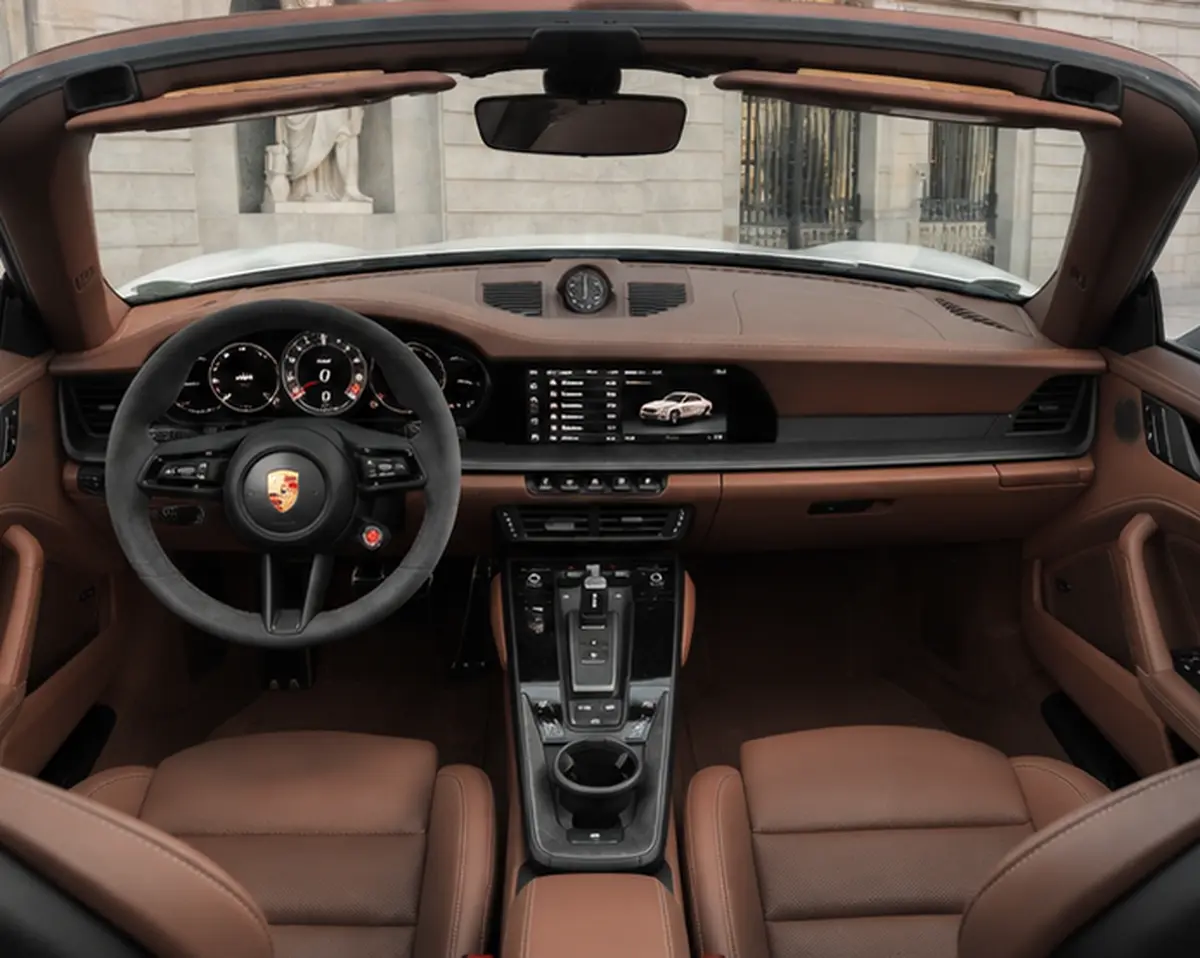 Porsche 992.2 Carrera 4 GTS Cabrio 2025, interior — Lisbon Luxury Car Rental, Lisbon. The 2025 Porsche 992.2 Carrera 4 GTS Cabrio carries 540 hp through all four wheels, and…