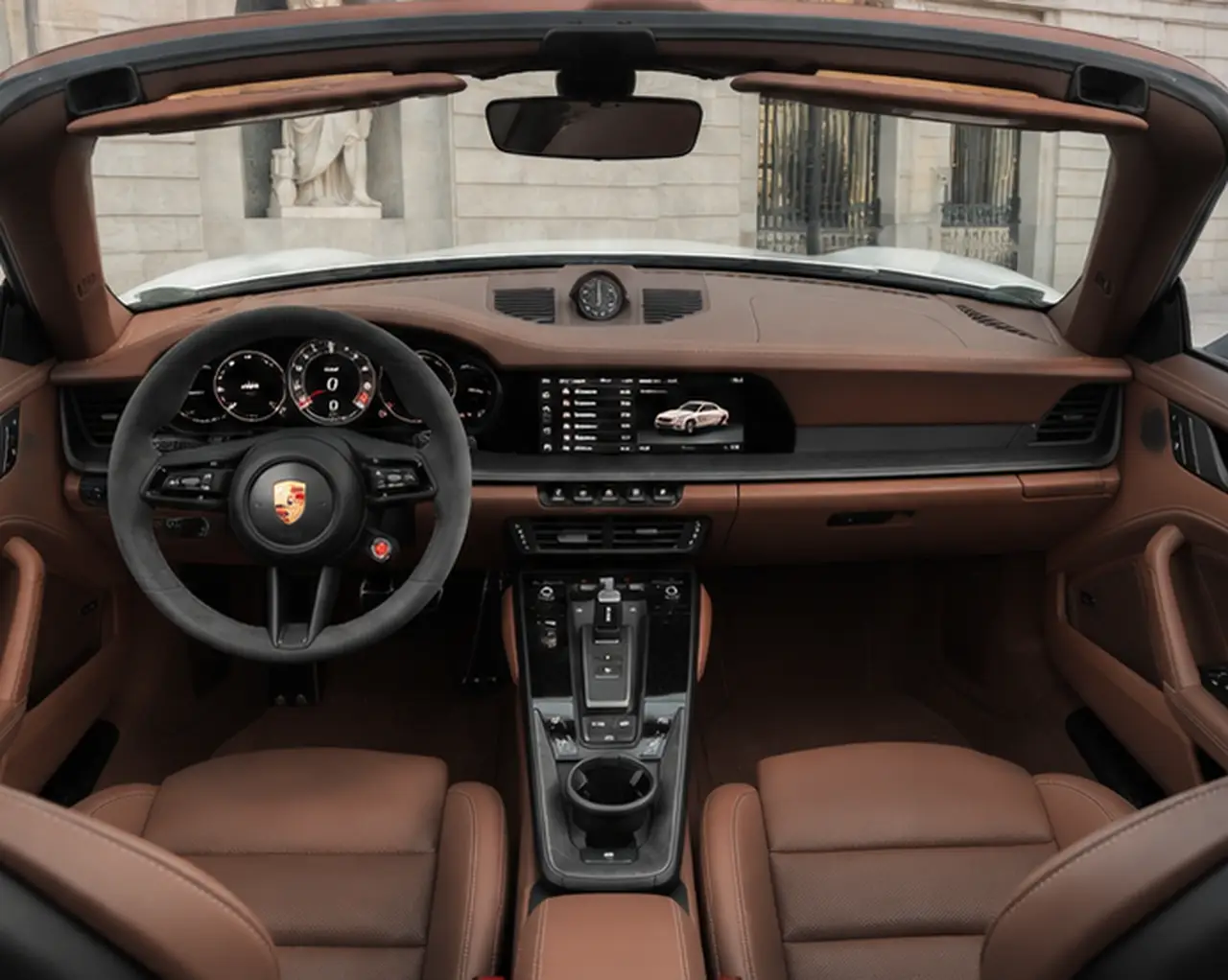 Porsche 992.2 Carrera 4 GTS Cabrio 2025, interior — Lisbon Luxury Car Rental, Lisbon. The 2025 Porsche 992.2 Carrera 4 GTS Cabrio carries 540 hp through all four wheels, and…