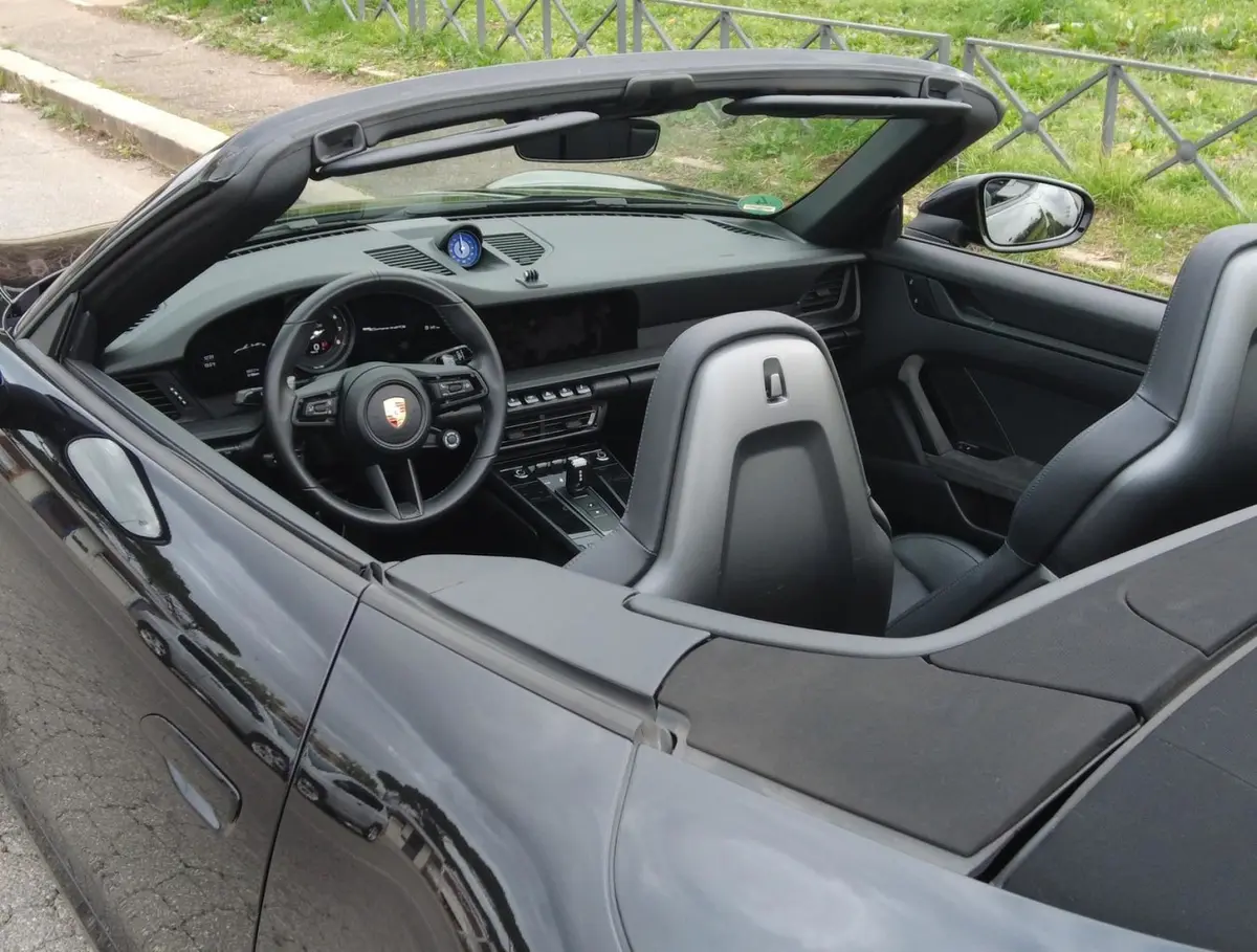 Porsche 992 Carrera 4 GTS Cabrio 2024, interior — Lisbon Luxury Car Rental, Lisbon. Top down for Cascais mornings, all-wheel confidence included